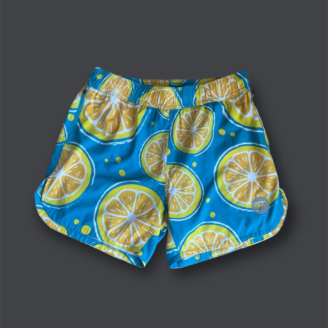Lemon pattern on blue running shorts